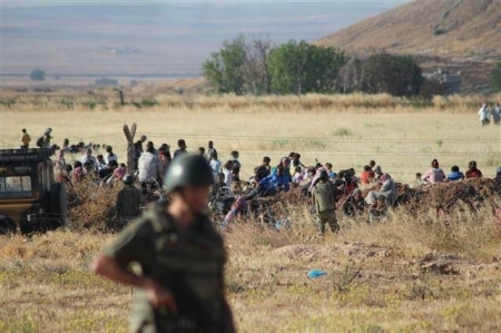 İŞİD çörək növbəsinə dayananları partlatdı (FOTO)