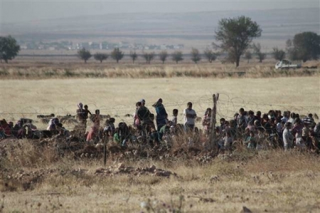 İŞİD çörək növbəsinə dayananları partlatdı (FOTO)